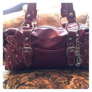 Red/ burgundy studded purse with charms